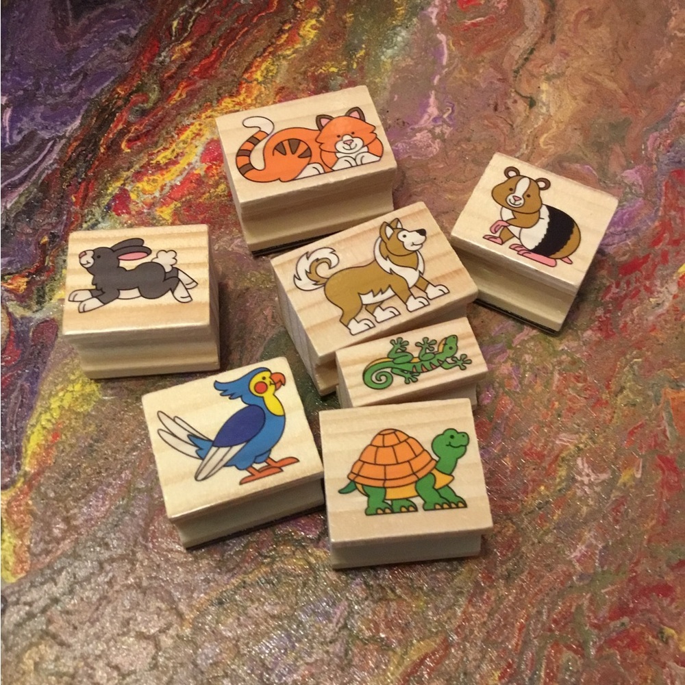 Never used rubber stamps, with wood handles.